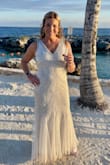 Wore this for our 25 year vow renewal. Dress is made well and was a perfect fit for me. Comfortable, somewhat heavy. Had the length hemmed. - Lisa L.