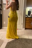 I bought this dress with a few others and loved it. Good price and looks like the photos. - Marquessa N.
