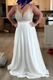 Love this dress!! Extremely long so will have to have it hemmed but great quality and gorgeous!! Bought to wear to my wedding rehearsal dinner - Kayla D.