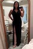 This dress was stunning on. It fits beautifully from top to bottom. I felt fantastic as soon as I put it on. It has a little stretch to the material, but the material is also thin enough to not show every bump and blemish.  The top has a wire at the V on the bust, which keeps it in place, but it is also lined on the top of the back with silicone so it doesn't slip down and feels secure. It is a great quality, especially for the price! Highly recommend it! - Tiffany M.