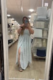 I got this dress to wear for my wedding rehearsal/on my honeymoon, and I'm OBSESSED with it! It is super comfy, and the material is light and soft but not see-through! The top is tight enough to where you won't need to wear a bra if you don't want to, but you still can so it's nice to have the option! You can also dress it up or down. I will be wearing heels during my rehearsal but wore it out with my birks, and it looked cute still! I haven't had my wedding yet; it's on April 24th, but I do have a picture from the first time I wore it out!! - Erin R.