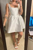 This is truly my favorite dress I've ever purchased. I had no issues with it running small or large; I ordered a medium, and it fit me absolutely perfectly!! I'm completely in love with it. I personally think it's made very well; the material is super thick and the dress feels so sturdy! The dress is wrinkly in my photo because it was straight out of the bag, but I steamed it and the wrinkles came right out. - Caitlyn D.