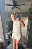 I love this dress the color is beautiful and the flowering is perfect. I can't wait to graduate and feel amazing! - Carlee S.