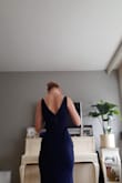 I got myself the dress in a small, I have a normal body with some hips and a narrow waist. However, this dress has to be pulled down constantly since it likes to crawl up to my waist and rest on my hips. Also, the fabric around my waist is too loose, it looks as if I'm not curvy but boxy. It doesn't hug my body. Sizing up would mean the dress doesn't fit and will fit too loose all over. Sizing down will not help either since I'm afraid my hips will not fit. I do believe I have the correct size but I am not pleased with how the dress fits. I believe I cannot return it either, it took quite some time to be shipped in the first place. The dress is nice and the color is very nice but doesn't fit good, unfortunately. I bought it for a wedding, now I have to search for a new dress since the shipment took its time and it doesn't fit. The wedding will be in two weeks, hopefully, I find a dress that isn't too pricy since I already paid for this one. Hopefully, I will get a refund. - Lisa K.