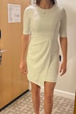 This dress fit perfectly, and looks really great. Comfortable too. The material is a little stretchy so it gives but doesn't stay stretched out. It's also thick enough material to not be see through. I wore this to a work ceremony and received many compliments. I will wear it again for sure. - Lindsey W.