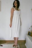 I am absolutely amazed by this dress! I've been looking everywhere for a below-the-knee strap dress, and this one did not disappoint! I ordered an XS (I usually go for S, but it runs large at the bust sometimes, as I'm small-chested), and it just fits perfectly, no tailoring needed. It's the perfect dress for everyday living and not see-through at all. It really is worth the investment. - Camille L.