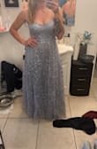 This dress fits very well! The length is also perfect. The color is similar to pictures. - Lauren A.