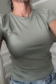 I ordered 3 of these, one in each color, and ordered a large even though I'm typically a small/medium in tops. It runs small, but the large fits me. It's also kind of short. I'm 5'3 and can just barely tuck it into my shorts. I do like them though. Will definitely show sweat. - Kim T.