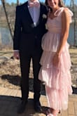 Pretty dress! Very feminine. Length was great not to trip over. Top was a little roomy but worked with the right push up strapless bra. Lots of compliments at prom! - Janelle B.