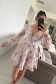 Beautiful spring dress! It's not too short and fits really nicely. True to size. - Janelle L.