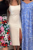 Was the perfect bridal shower dress that wasn't see through. Finding white outfits for all your wedding festivities can be challenging and some white dresses aren't thick enough, but this dress was thick and great quality. Was comfortable and the small slit and dainty straps were the perfect balance of sophistication. - Kelcey S.