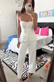 I originally ordered a S but returned for an XS. The S was a little too big in the chest and waist. The XS fits perfectly. Not the most tall girl-friendly, as it was a little short on me (5'10). Wrinkles easily! - Morgan M.