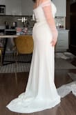 This dress was not at all flattering and was SO TIGHT in the arm area. The off shoulder style was not it for this one. Also, it runs very small so size up at least one size, maybe even 2 if you want to be comfortable - Sofia N.