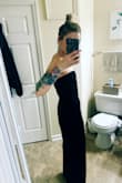 I am usually more of a dress girl, but after getting some massive bruises on my legs right before a friends birthday party, I decided to give this a try. It looks great and feels comfortable, but secure. The key to zipping it up in the back by yourself is to clasp the little hooks at the top of the zipper first and then pull it up over your chest and zip it all the way up. I really really like it! - Kayla M.