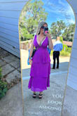 The dress was a little small in the boob area to zip up but it still worked. The zipper felt a little weak. Very cute dress. Loved the color. The top did seem to fold over which was a little annoying. - Jamie B.