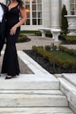 Wore this for the black tie wedding! It is beautiful and fit well. The only con is the sleeves would come down if I bent down at all. Not a huge issue but I did have to keep fixing them - Lindsey M.