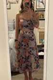 I was looking for something springy but also something that could be worn to other functions than a wedding (hence the two piece!). I find it to fit true to size both in the bust and waist/hip area. Not see through, and does have a key hole between the boobs on the underside (which I didn't notice until the other reviews). It also has sequins? Like clear ones which I found odd as I feel like I didn't notice that in the pictures. They aren't terribly noticeable but now that I know they're there, it is. Overall, I like it though! - Lindsay H.