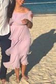 I'm pregnant and this was flowy but fitted enough to not be a blob. Got tons of compliments. Perfect for the dance floor at the wedding I was at. Can't wait to wear it again. - Cassie S.