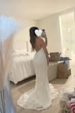 Ordered this dress as a back up and& I AM DEF wearing this one instead! Just wow! I'm wearing this for my beach elopement. The only complaint I have is the bottom portion is a little loose for me so I will try to see if I can get that altered. Other than that, the neck portion fit me just fine along with the waist area. Def can't wear a bra with this as it is backless but that's the best part of the dress! I can't wait to wear this dress on my special day! Def can't beat the price too! - Destiny H.