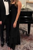 I absolutely loved this dress for a black tie wedding in March. I felt so good in it and got a lot of compliments. I bounce between small and medium in dresses, and the medium fit great. I'm a little more broad at the top and tall, so it was the perfect length and fit. The straps were adjustable, which also was so nice. I can't wait to wear this dress again. It's a classic that I think I'll keep for a long time. Good quality and it will last - Holli W.