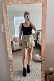 I am usually between small and medium or a 4 and a 6. I went with the medium, but it still feels so short. And I'm only 5'3. The fabric feels really nice, but I feel like I kept needing to pull it up. It is also very low cut in the back, so if you like to wear a bra, it's kind of a problem. - Alissa S.