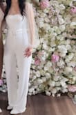 This was the perfect jumpsuit for my bridal shower. I received so many compliments on it. I could have hemmed the bottom of the pants as they were a little long but I didn't have time to do so before my event. - Claire K.