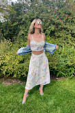 This is a beautifully made dress. I love it so much! The print and details are gorgeous in person. Just note there is little to no stretch in the top. I love that the straps are adjustable. 5 Stars all the way. - Lindsay C.
