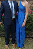 Not all Lulu's dresses are long enough for tall women. I am just over 5'10 and with 2 inch heels, it sat just right above the floor - perfect length for me! The fabric is stretchy and really comfortable, but I had the same problem as other reviewer where the fabric on the top of the slit didn't sit right. The pleating helped hide the fabric inconsistencies though. I used some fashion tape to extra secure it to my shoulder. I received a lot of compliments at the black tie optional wedding, and I absolutely crushed the dance floor wearing this dress. - Trish D.