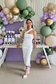 To say that I felt gorgeous wearing this is an understatement. The dress is simply stunning and elegant. I got so many compliments. It hugged my figure in all the right places and the fit was so amazing. Also, it was super comfortable. I used it for my Bridal Shower and the whole buying, international shipping and customer service experience was so special. I truly felt just like I pictured it in my mind: the happiest bride to be. - Nancy E.
