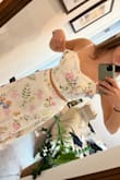 I really wanted to love this one. I tried it in a small and medium and the two pieces are all out of wack. The top sides pop out and feels like it wasn't made to hold boobs, and the skirt bunches up and is too big. - Danielle S.