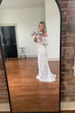 I love this dress so much! I wore it for our elopement and it was everything I wanted. I wore dark brown cowboy boots with it and he wore dark jeans, blazer, vest and a cowboy hat. The top part was a tad big and I pulled it up/adjusted several times but overall it fit very comfortably. The dress is excellent quality, with the exception of the zipper- be very gentle with it because it's hard to zip/down. But the lace top is to die for! I chose those one over 6 or 7 other Lulus dresses (but had many close seconds!). Absolutely recommend it for your wedding! - Mandy S.