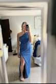 Such a beautiful and flattering dress! I did order a medium to start and it fit nicely but just was a little big in the chest area, so I ordered a small and the small fights great! Overall definitely not as loose fitting as the medium but I liked how the small fit better. It's also fairly stretchy too! - Maggie G.