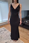It is great quality, very well made and looks beautiful. It fits good and the length is perfect for me (because i will be wearing only 2.5 inches heels). It is a little tight on my butt and a little loose on my waist, but the material is very stretchy so the tight part isn't uncomfortable. I did go see a seamstress to reduce at the waist (really just a little bit), so it fits perfect, since i will be a bridesmaid. But on the pictures it is as I received it and it is not bad at all. Overall very happy, its going to be stunning! - Marie B.