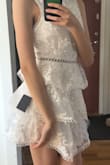 I bought this dress for my graduation. It has one of the best materials and no see through, which is a big plus.
It's well fitted and true to size. I would recommend you to buy size XS if you're a small S or between xs-s. Buy S if you're a S-M with a waist between 66-69 (26-27 inches).
About me: I'm 172 cm tall, usually wear XS-S.
The dress I bought is an S. Size XS would fit me even better!
My waist is 64 cm and it was a bit big around my waist but it's completely fine. If you want to show your beautiful form I recommend you to buy your size or smaller. Take a smaller size if your waist is smaller.
And I also recommend you to take a look at the models height and size and also check lulus sizes, it helps a lot!
Have a great day! - Maria G.