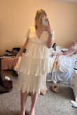 I bought this for a pinning ceremony and LOVE it, it's exactly what I was looking for! For reference, I'm 5'9 and I wanted it a tad bit shorter so I tucked the band up under the bra line. Super classy looking and really good quality, definitely worth the price!! - Jacqueline M.