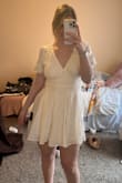 I usually wear a Medium in dresses, but thanks to other reviews I ordered a large and I'm glad I did because it fits perfectly since the waist has no stretch. I hope this helps! I'm also 5'9 and I think the length is perfect - Jacqueline M.