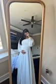 I love this dress and fits beautifully! I actually had a bump and it still fit! It's a bit long but I'm on the shorter end. - Jeel B.