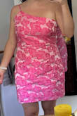 I ordered a few dresses from Lulus and ended up going with this one for two weddings coming up in May and June. It hugs your body in all the right places, has thick high-quality-feeling material, and the embroidered roses and satin-y light pink give the dress a lot of interest. The roses are a bit darker than expected but I don't mind. I can wear a normal strapless bra and don't feel like I need to wear shapewear. Super happy with this purchase. - Christina K.