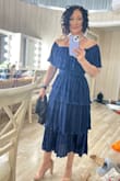Another dress I bought as a mother of the bride dress for my daughters wedding. Beautiful dress, loved the fabric! I should have gotten a medium but small was all that was left. There is a trick to get it to zip as there is not much give if it's smaller than you need. (Twist dress to where zipper is in front, zip then twist and pull rest of way up). Tight but worked and was BEAUTIFUL! Was my "reception" dress, since my bride daughter and her entourage couldn't help me decide, we went with a wardrobe change! Perfect! - Julia W.