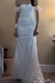 I absolutely love this dress. I was a bit skeptical ordering online, but after seeing the reviews I knew it was a must! I tried it on and I knew it was the one. :) It's perfect for my small wedding. - Brynn C.