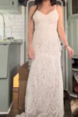 Very cute and I loved the color. Not too white but also not too dark. Decided to go with something else, but it was the runner-up!
You can see in the picture it is see-through, so make sure you wear the correct undergarments. - Geraldine R.