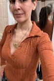 I absolutely love this bodysuit! I was a little weary of how thin the material felt and that between the ribbing was a bit see-through. As soon as I put it on, I knew it was a keeper. It's a beautiful rusty color (not too orange, not dull). The material is soft, smooth, and fits snug without looking too tight. The ribbing and collared v-neck give it a bit of a retro 70's vibe that I love. Lol great with dark jeans and the Mad for Plaid mini skirt from Lulus (pictured) - Coribeth M.