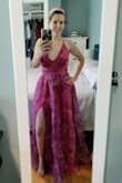I love everything about this dress. It was absolutely perfect to be the MOH in my little sister's very colorful wedding. The color and pattern are so beautiful. The cut is lovely, and I love the draping though the bodice. The skirt swishes so nicely as you walk and dance, showing off the high slit with every stride. - Coribeth M.