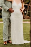 This dress was very pretty and comfortable. The beading and details looked great. The quality was great for the price. If you are thinking about ordering a wedding/reception dress from Lulus, you should! - KASEY P.