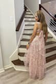 It fits perfectly to the size. Cute and perfect dress for spring parties or Easter. - Eli S.