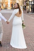 I loved this dress! I was looking for a long sleeve wedding dress for my elopement because we did it during the winter. The dress was good quality and thick material so it was not see through. It looked beautiful! The only issue I had was it tended to fold so I had to straighten out/adjust the dress for the photos. But other than that it was a 10/10! - Emma W.