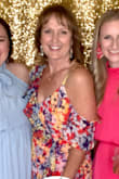 This dress is fitted from the bust down to the waist and flows from there. The fabric drapes beautifully and the colors are great! I love everything about this dress! - Cheryl M.