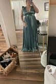 Dress was exactly as pictured. I'm a little short but have a really big chest. The XL was perfect! I originally ordered the L and the chest was too tight and the dress BARELY zipped. I do wish the piece of fabric under the bust fell more on my hips than under my chest but it's still gorgeous - Alyssa L.