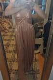 The material was far from what the picture showed, the dress was HUGE and I'm usually a 2-4 but I would definitely size down, the strap came broken and the color of the dress was no where near the same as the picture. I was surprised because when I ordered with Lulu's in the past it was great! - Clara R.