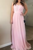 I bought this for my daughter's prom and it's super cute on. It is long but works great with heels.  The zipper kind of gets stuck but that's my only complaint. - Nia D.
